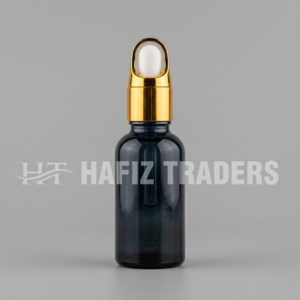Empty black shine serum bottle with golden golden cap