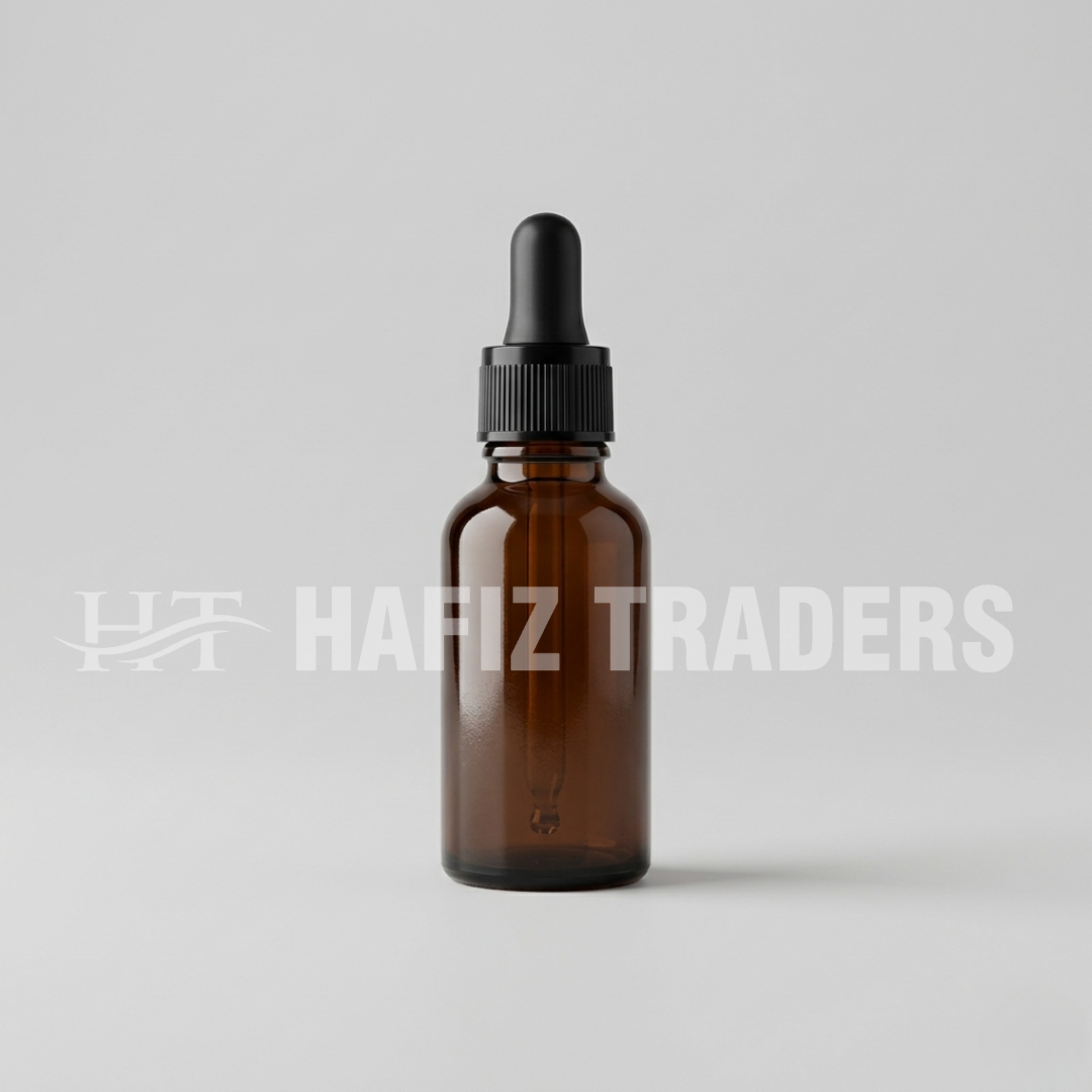 Empty amber serum bottle with black cap