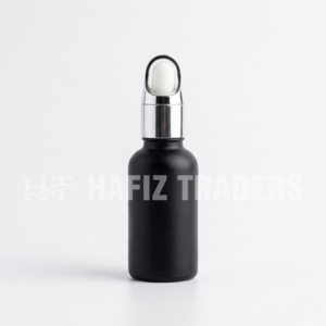 Empty black matt serum bottle with golden silver cap