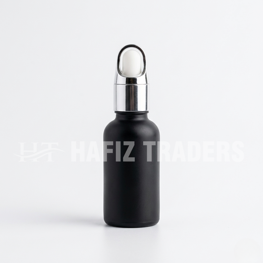 Empty black matt serum bottle with golden silver cap
